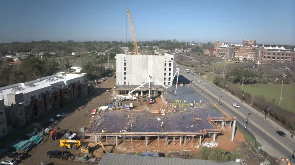 Aerial view of elevated slab concrete placement at Perla Student Housing in Tallahassee FL